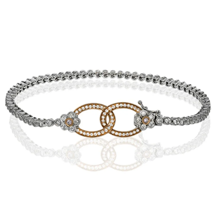 Women’s modern bangle bracelets-Charming and whimsical, this delicate white and rose gold bracelet glimmers with 1.45 ctw of round white diamonds as well as .04 ctw of delicate pink diamonds and features a subtle floral motif.