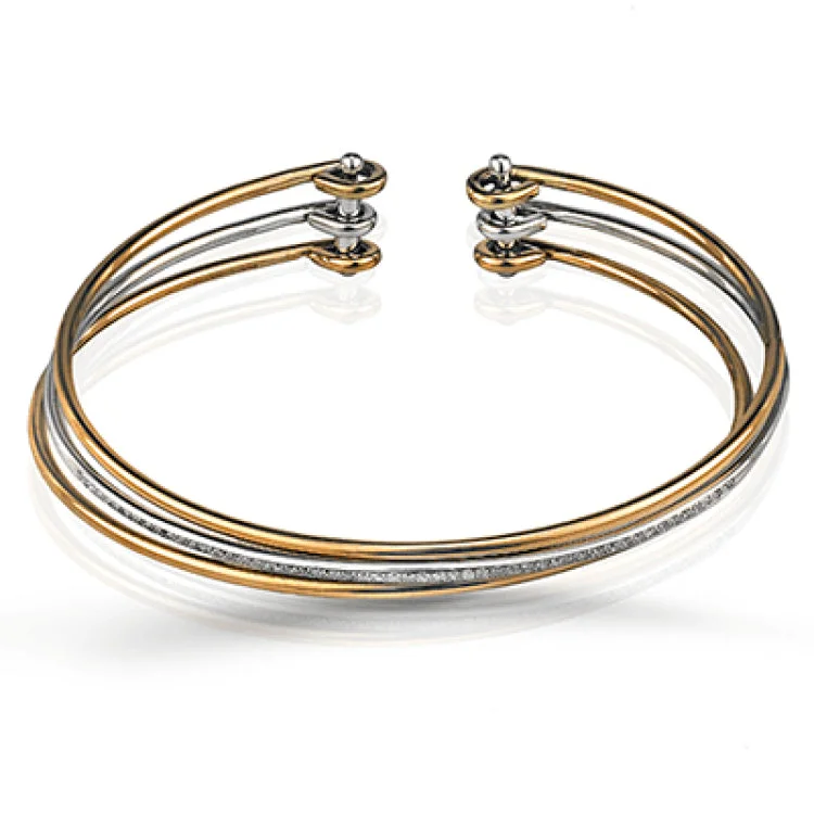 Women’s diamond tennis bracelets-Reflecting an eye-catching but simple contemporary design, this three-tone open-style bangle bracelet is accentuated by .22 ctw of white diamonds.