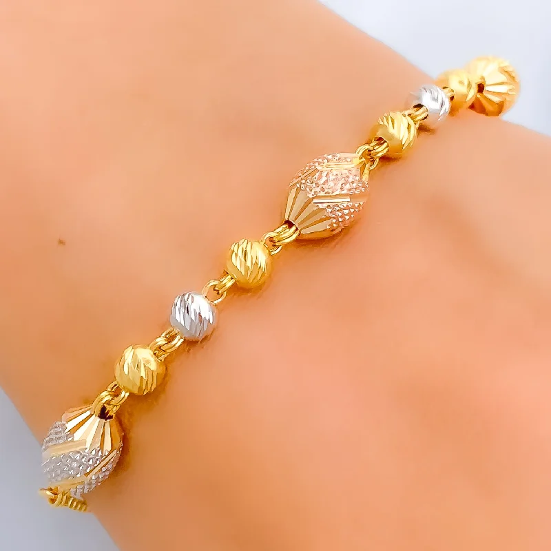 Women’s engraved bracelets-Unique Elongated Orb 22k Gold Bracelet