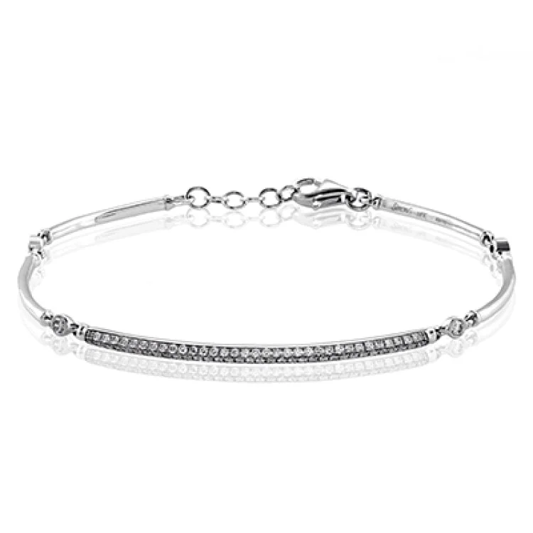 Women’s delicate bracelets-This delicate bracelet is perfect for adding a special sparkle to everyday with .48 ctw of white diamonds.