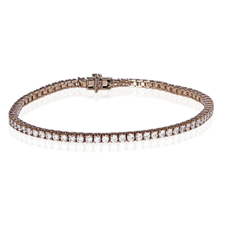 Women’s matching gold bangles-This classic 18K rose gold diamond tennis bracelet features 3cttw diamonds and is a great addition to any jewelry collection.